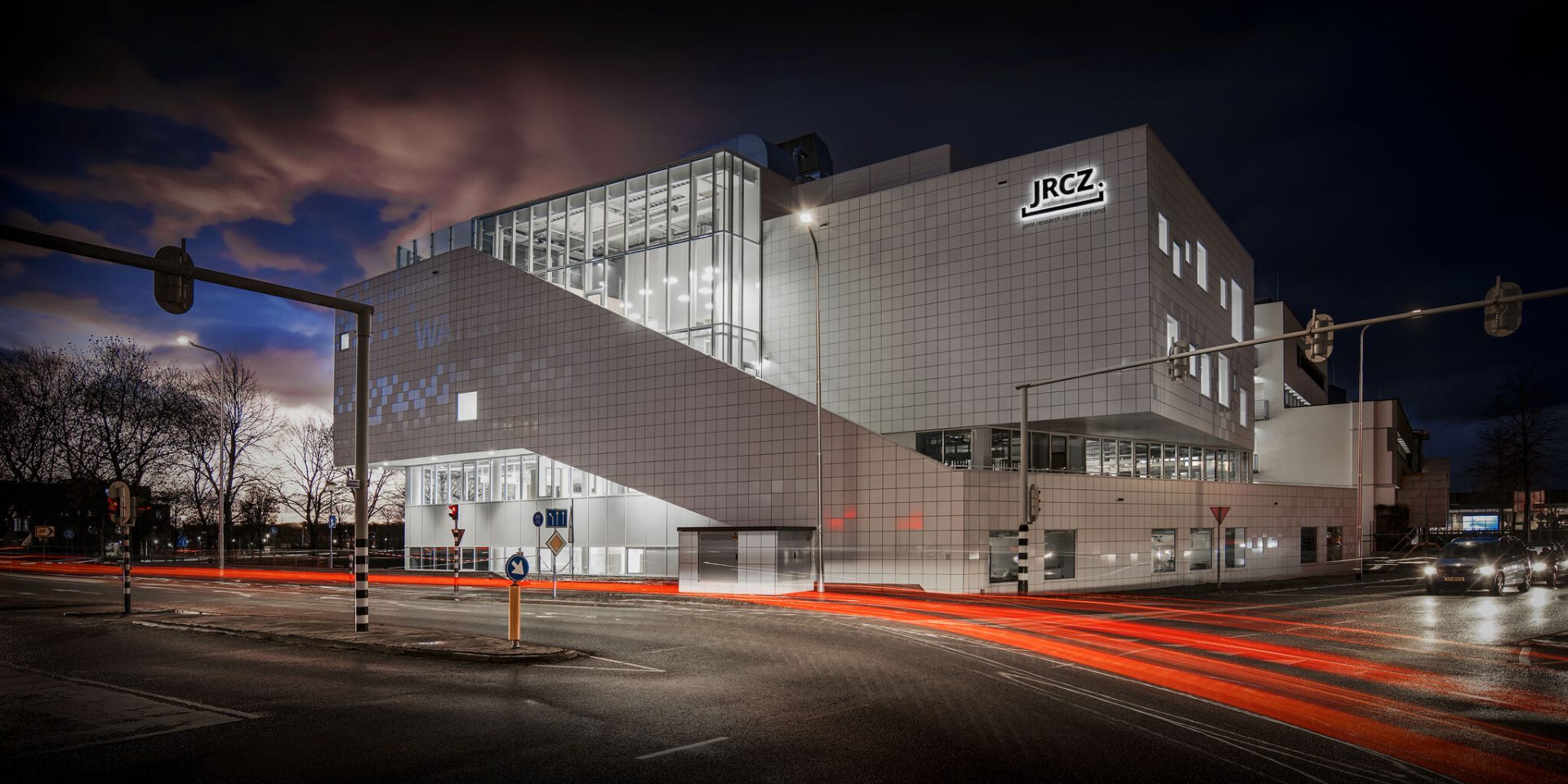 JRCZ by night, long-exposure photo that shows trails of car lights, with the JRCZ building standing tall